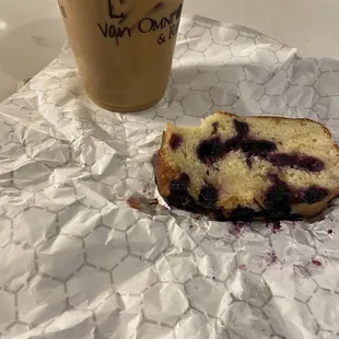 Iced Vanilla Latte with Oat Milk with a blueberry/lemon pastry.