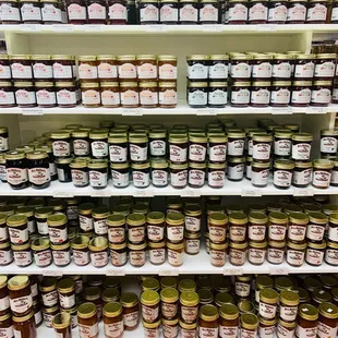 a shelf full of jams