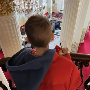 My seven year old appreciating the architecture and apple juice.