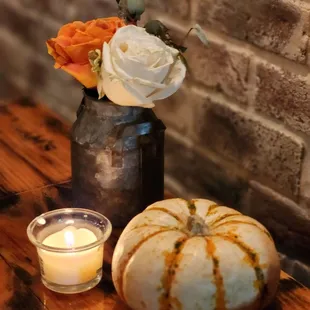 Fresh flowers and candles on each table