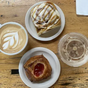 Left: caramel latte  Top: butterscotch cinnamon roll  Right: cold brew  Bottom: strawberry rhubarb kouign amann