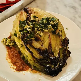 a plate of grilled cabbage