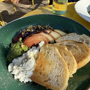 The heirloom beets, pair, pesto, and bread was amazing.