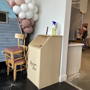 not the classiest way to keep your cleaning stuff and extra chairs