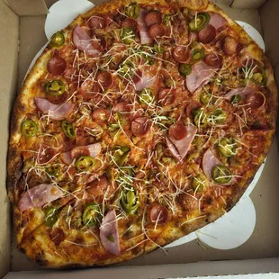Meat Lovers pizza with added jalapeños.  Delicious