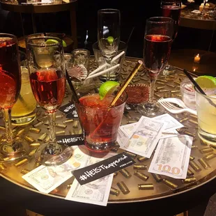 Fancy cocktails and hundred dolla billz.