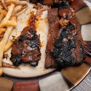 Half rack of ribs, very charred...