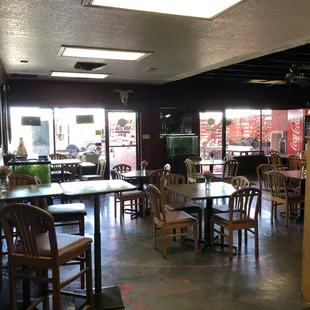 A shot of the dining room with socially distanced tables.