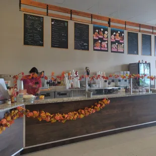 a restaurant with a long counter