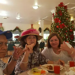 The atmosphere gives a feel of "old plantation" with classy holiday decor. We will be back. Buffet cheap and ono.