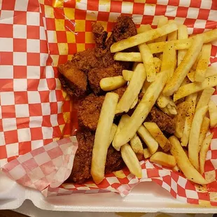 Hella hot chicken with gas with seasoned fries