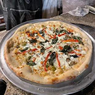 In the Zone pizza. Very good with Mozzarella and goat cheese and your choice of 3 veggies