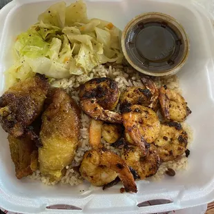 Jerk Shrimp, Steamed Vegetables, Plantain, Rice and Peas