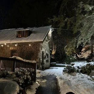 a house in the snow at night