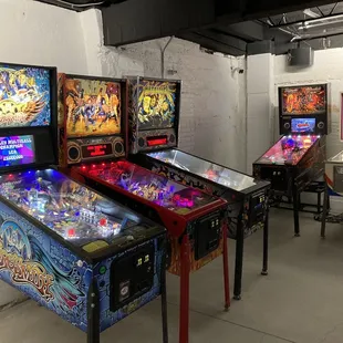 a row of pinball machines