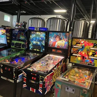 a row of pinball machines