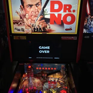 a pinball machine with dr no on it