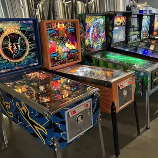 a row of pinball machines