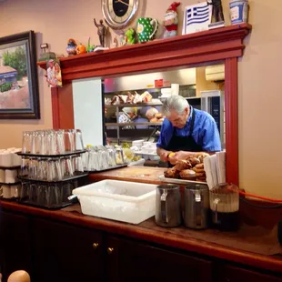 From the counter, you can see into the kitchen.