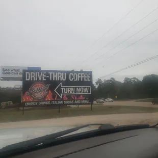 a drive thru coffee billboard