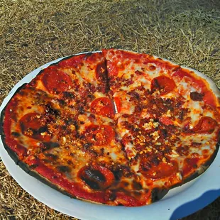 The Glutton, with pepperoni, bacon and chorizo, and some added garlic. Great portion for the price!