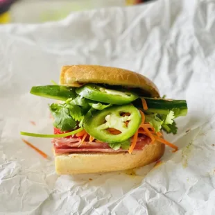 a sandwich on a piece of paper