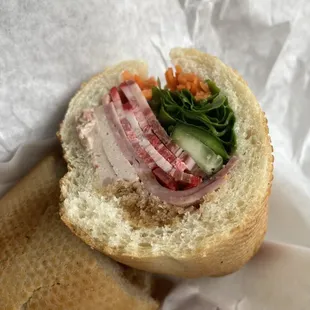 Amazing composition in this banh mi, 4 coke cuts, two sauces, and below $10!