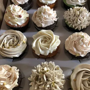 Strawberry, Pistachio, Chocolate and Honey Carrot cupcakes with Vanilla Swiss Meringue Buttercream....yum!