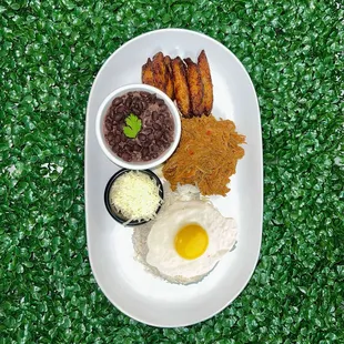 Shredded beef, black beans, rice, sweet plantain, white cheese and egg.