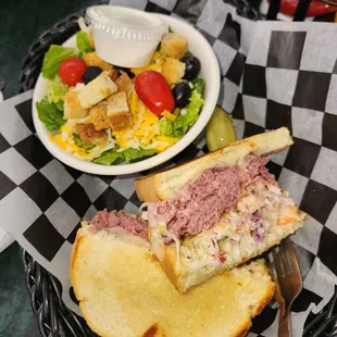 The New Yorker sub sourdough with a side salad