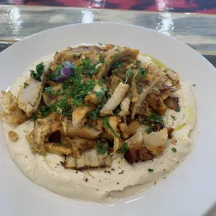 Chicken shawarma over hummus is excellent