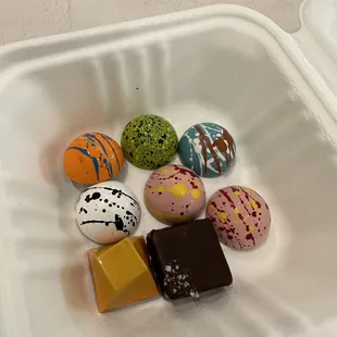 a variety of chocolates in a container