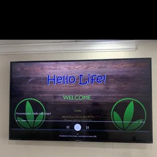 a welcome sign on a wall