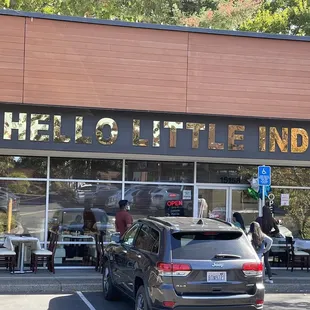 a car parked in front of the store