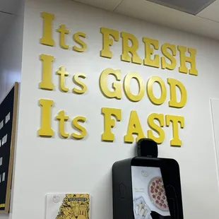Inside of the store but please note the lack of apostrophes which needs correction.