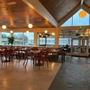 a restaurant with a view of the water