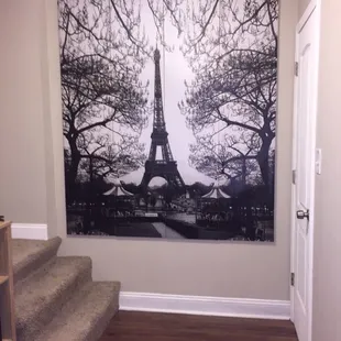 Accordion room divider that I removed the hardware on and turned it into a wall piece!