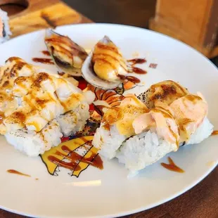 Baked Scallop Roll (left), Baked Salmon Roll (right) and Baked Mussels (top)