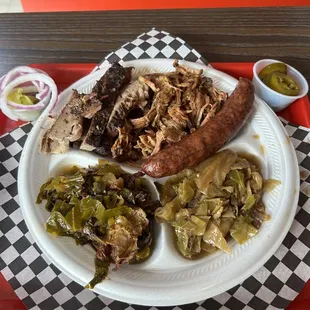3 Meat plate with Pulled Pork, Sausage, Brisket, Collard Greens and Fried Cabbage.