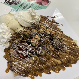 a plate of waffles and ice cream