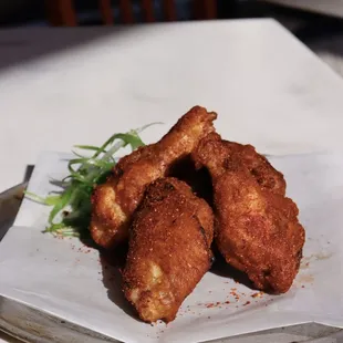 a plate of fried chicken nuggies