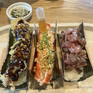 Shrimp Tempura, King Crab, and Wagyu Hand Rolls.