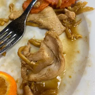 a plate of food with a fork