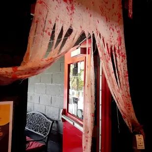 a bloody door and window