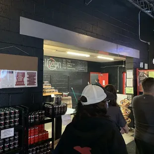 a crowd of people standing in line