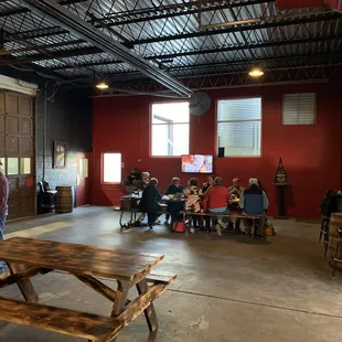 a group of people sitting around a table