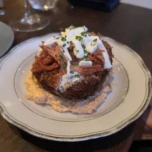 Fried tomato with mozzarella and chipotle pepper sauce