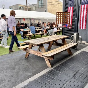 a picnic table with a flag on it