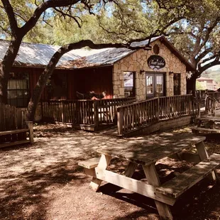 a picnic table and a cabin