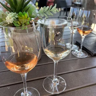 two glasses of wine on a table